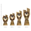 Academic Antique Gold Lynx trophies next to ruler Academic Antique Gold Lynx trophies next to ruler