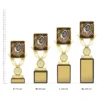 Archery Lynx Sentry trophies next to ruler Archery Lynx Sentry trophies next to ruler