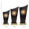 Baseball Spartan Crest Baseball Spartan Crest trophies next to ruler