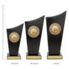 Basketball Spartan Crest trophies next to ruler