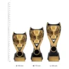 Cup Nova Cup Nova trophies next to ruler