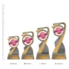Dance Arclight Showtime trophies next to ruler Dance Arclight Showtime trophies next to ruler