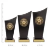 Dance Spartan Crest Dance Spartan Crest trophies next to ruler