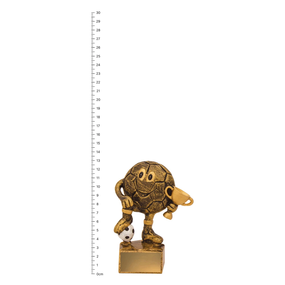 Football Character trophy next to ruler Football Character trophy next to ruler