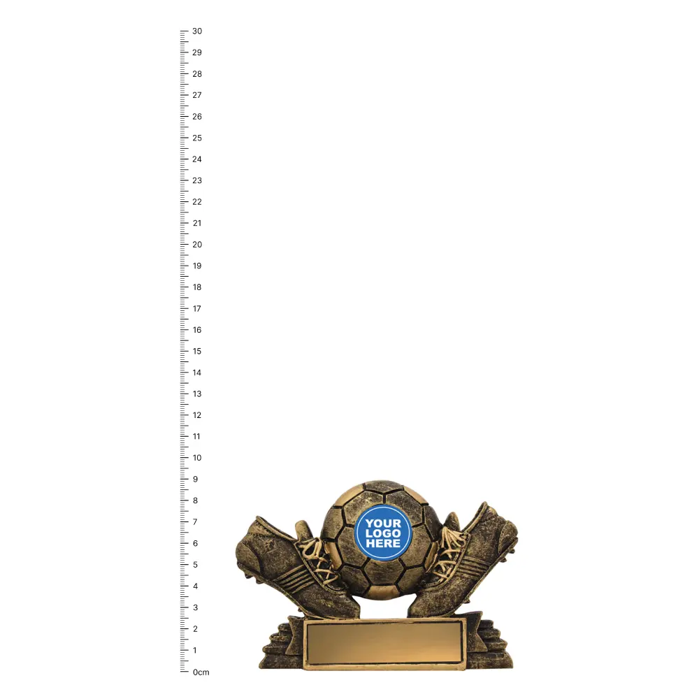 Football Mini Theme trophy next to ruler Football Mini Theme trophy next to ruler