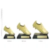 Galaxy Boot trophies next to ruler Galaxy Boot trophies next to ruler