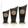 Hockey Spartan Crest Hockey Spartan Crest trophies next to ruler