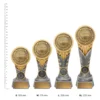 Netball IKON Netball IKON trophies next to ruler