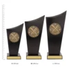 Rowing Spartan Crest Rowing Spartan Crest trophies next to ruler
