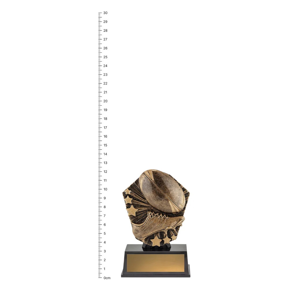 Rugby Cosmos Super Mini Rugby Cosmos Super Mini trophy next to ruler