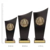 Sailing Spartan Crest Sailing Spartan Crest trophies next to ruler