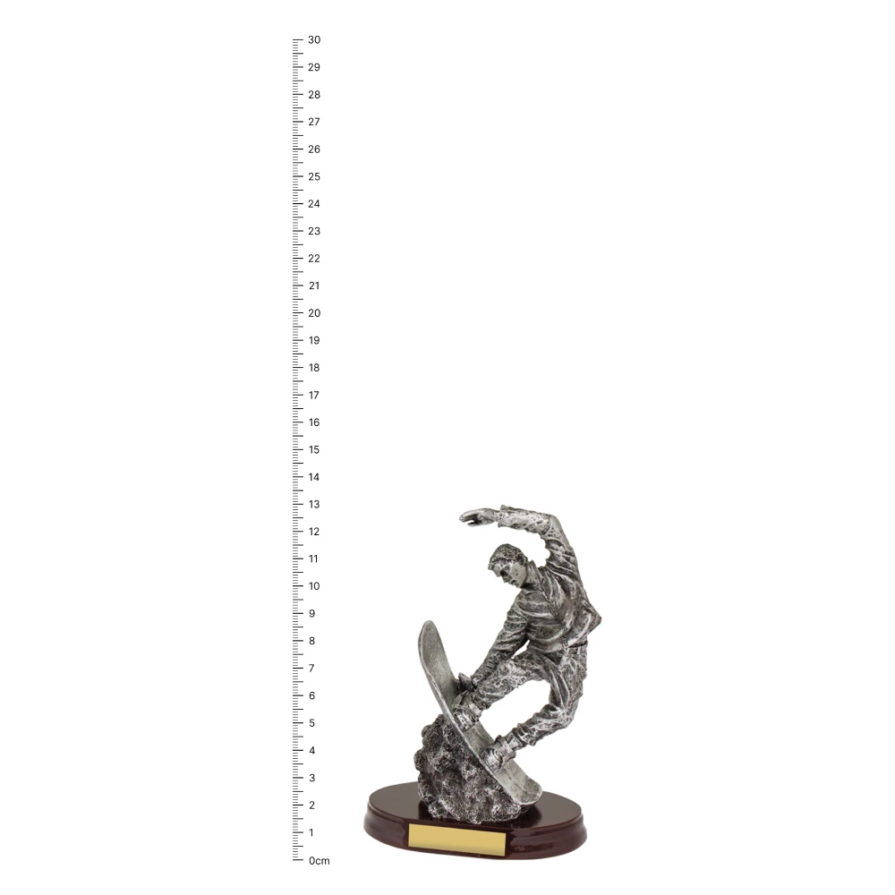 Snowboarding Trophy Snowboarding Trophy next to ruler