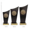 Squash Spartan Crest Squash Spartan Crest trophies next to ruler