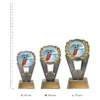 Surfing Polaris Colour trophies next to ruler Surfing Polaris Colour trophies next to ruler