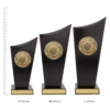Tennis Spartan Crest Tennis Spartan Crest trophies next to ruler