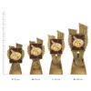Visual Arts Antique Gold Lynx trophies next to ruler