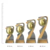 Volleyball Arclight Gold trophies next to ruler Volleyball Arclight Gold trophies next to ruler