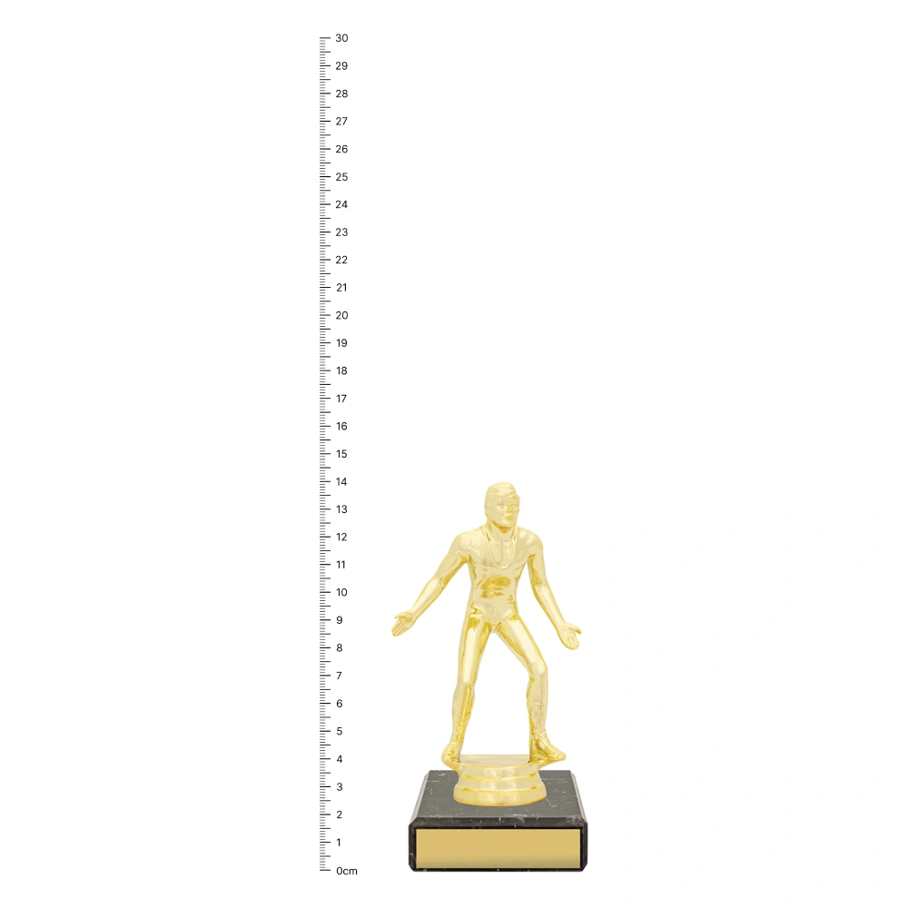 Wrestling Figure Trophy next to ruler Wrestling Figure Trophy next to ruler