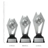 Water Polo Nighthawk Water Polo Nighthawk trophies next to ruler