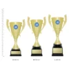 Willow Cup Willow Cup trophies next to ruler